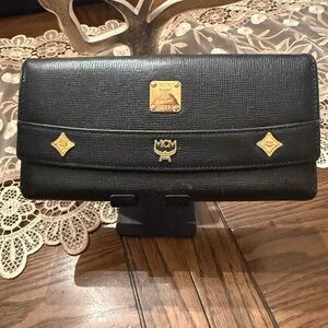 MCM Black Wallet with Gold Accents